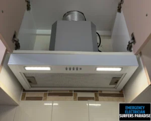 Ceiling-mounted air vent in a bathroom with sleek design.